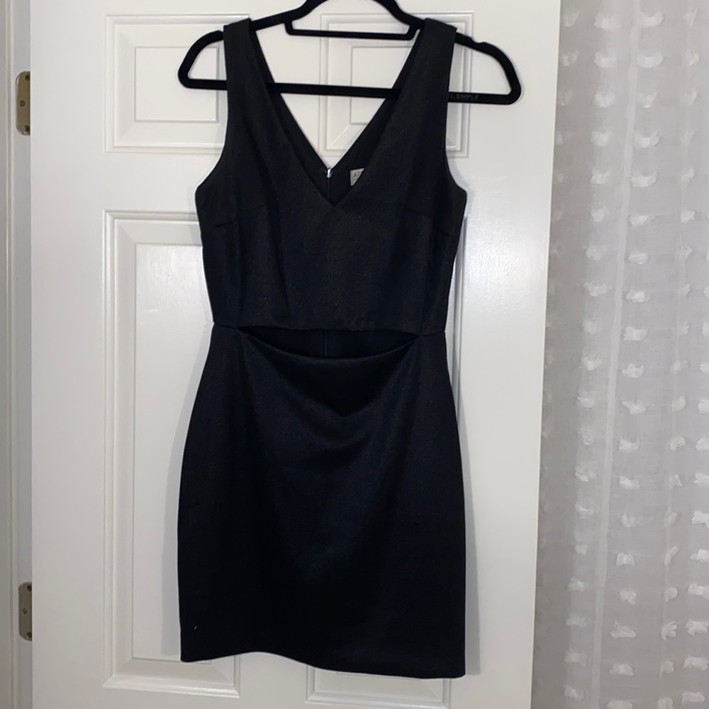 Black party dress with cutout from boutique. Size Medium. Worn twice